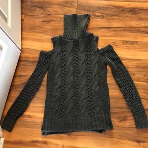 Turtleneck sweater with shoulder cutouts